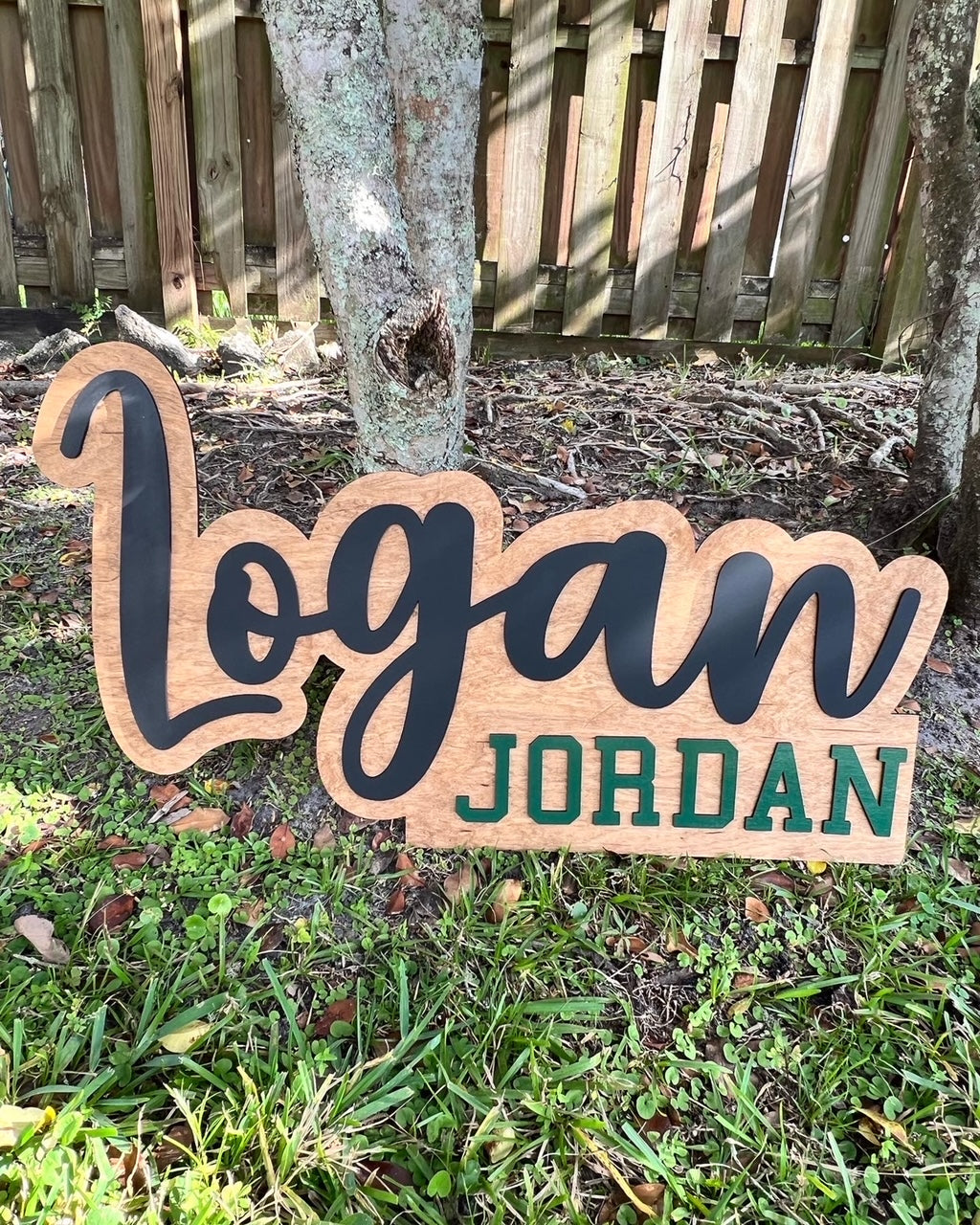 First and middle name outline sign on pink background