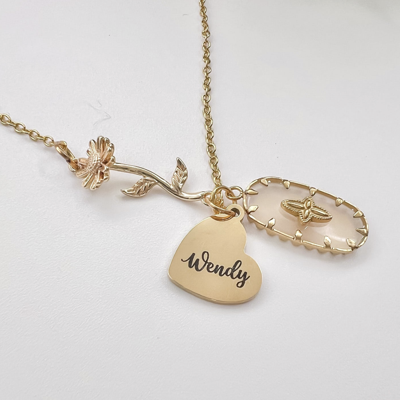 Rooted Wildflowers signature necklace - boho cross, birth flower, and heart charm with name engraving