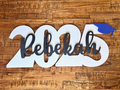 Wood graduation sign with cap and year