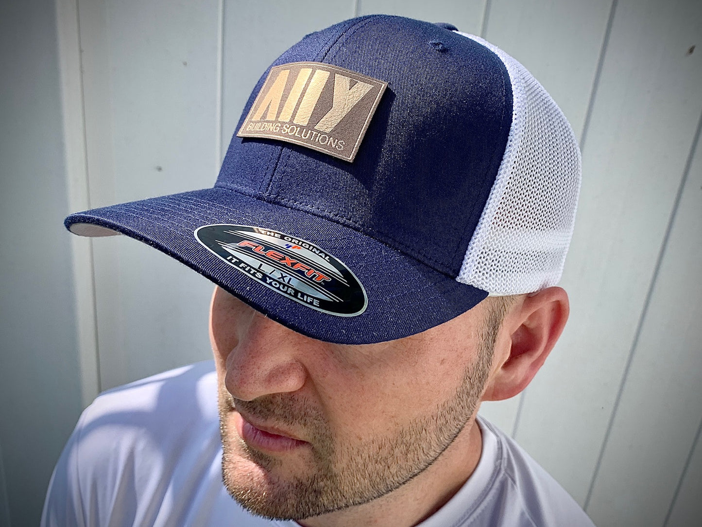 Custom Leatherette Patch Hat - Flexfit hat - Happyism, Inc. Engraving 