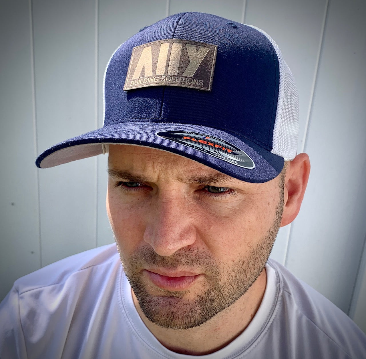 Custom Leatherette Patch Hat - Flexfit hat - Happyism, Inc. Engraving 