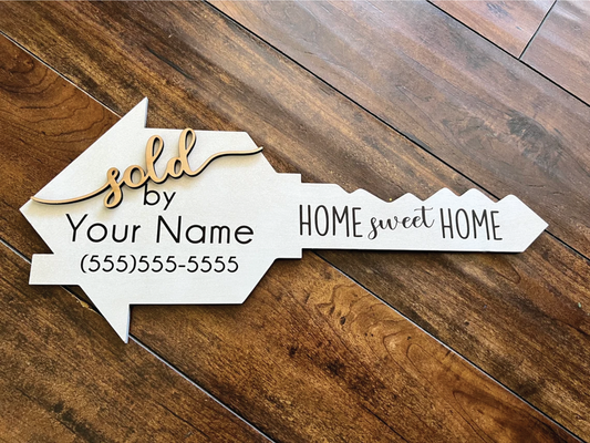 Real estate closing sign - real estate agent key